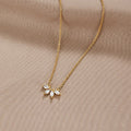 LAUREL | Collier feuille de cristal dorée